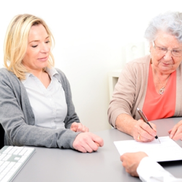 people at an estate meeting