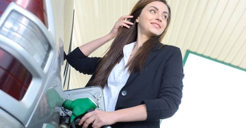 girl pumping gas