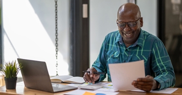 happy man with computer