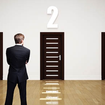 man choosing between three doors