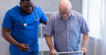 man walking with nurse