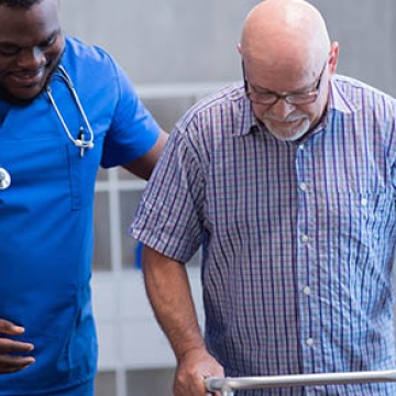 man walking with nurse