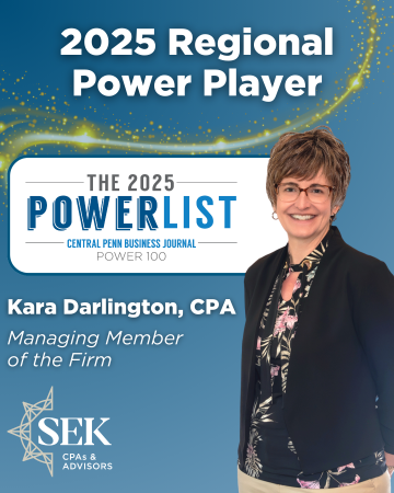 woman in business attire on blue background for award